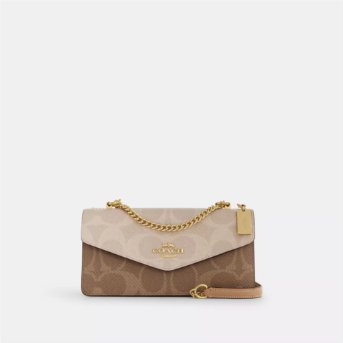 Coach Outlet klare envelope crossbody bag in blocked signature canvas