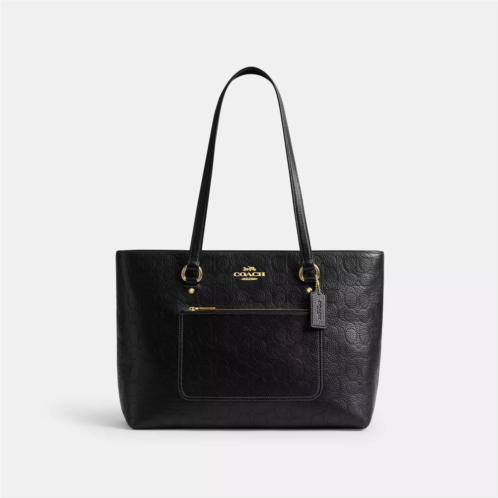 Coach Outlet station tote bag in signature leather