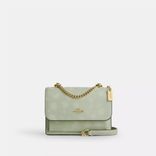 Coach Outlet mini klare crossbody bag with floral print