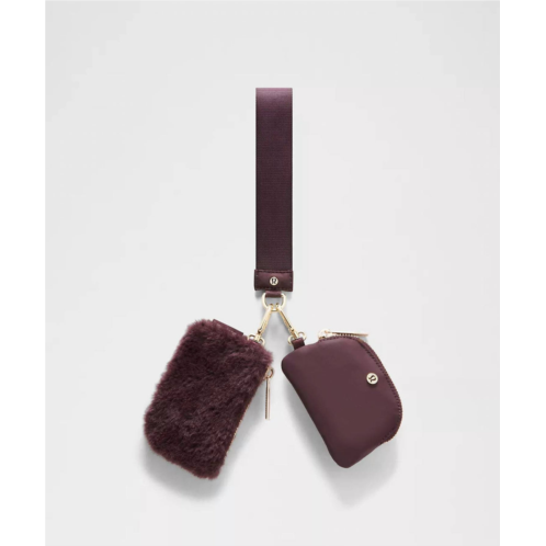 Lululemon womens dual pouch plush fleece wristlet in black plum/gold