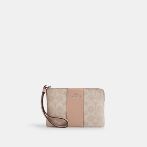 Coach Outlet corner zip wristlet in signature canvas with stripe