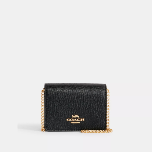 Coach Outlet mini wallet on a chain