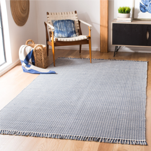 Safavieh montauk hand made area rug ivory / navy solid / tonal style non-shedding