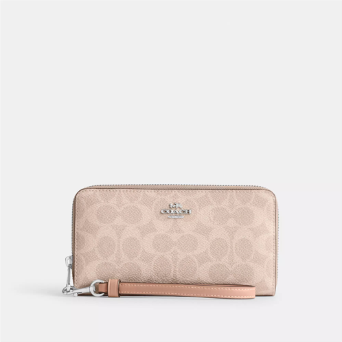 Coach Outlet long zip around wallet in signature canvas