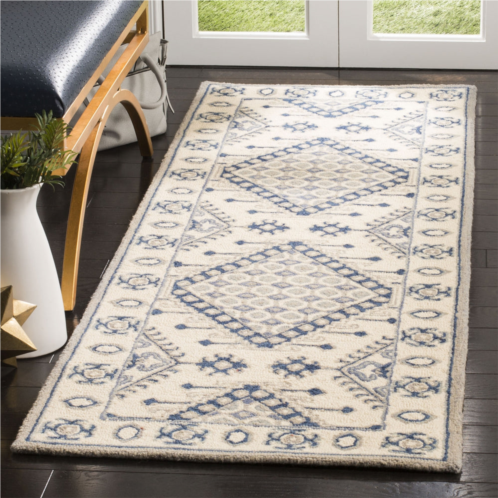 Safavieh micro-loop hand made area rug ivory / blue traditional style non-shedding