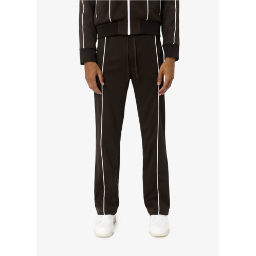Amiri sheen track pants in brown