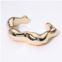 FASHNZFAB metal wavy dome cuff bracelet gold